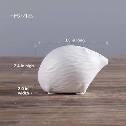 Minimalist Ceramic Decorative Piece Featuring A Small Hedgehog