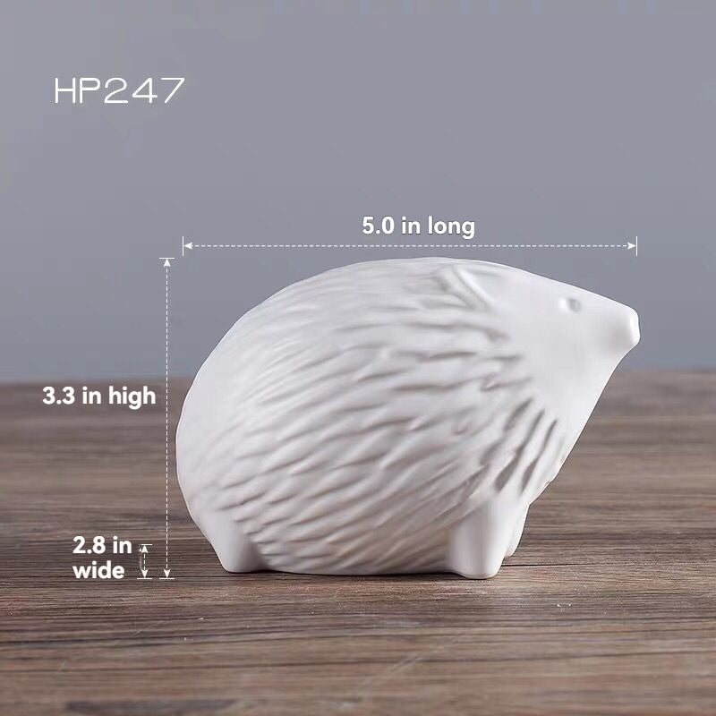 Minimalist Ceramic Decorative Piece Featuring A Small Hedgehog