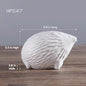 Minimalist Ceramic Decorative Piece Featuring A Small Hedgehog