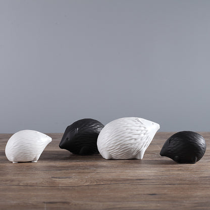 Minimalist Ceramic Decorative Piece Featuring A Small Hedgehog